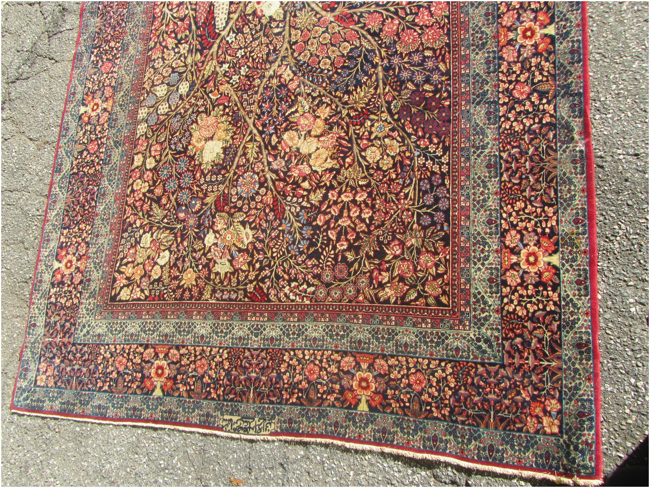 This is an antique hand-woven rug.